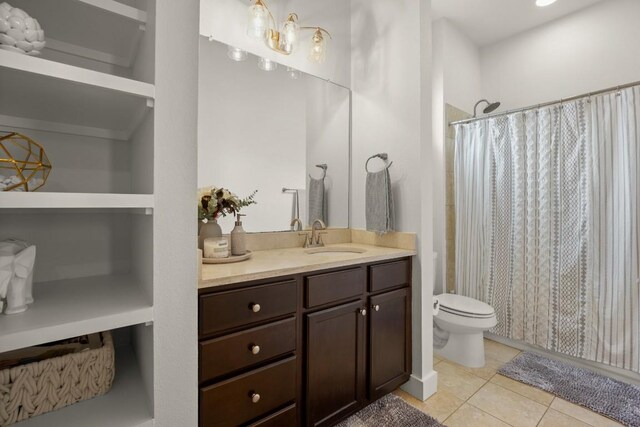 2520 Bluebonnet Ln Unit 32, Austin, TX 78704 - full bath featuring vanity, tile patterned flooring, and a shower with curtain