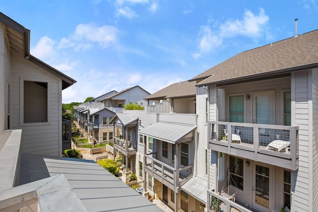 2520 Bluebonnet Ln Unit 32, Austin, TX 78704 - exterior view of a residential view, a downspout, and a shingled roof