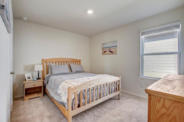 12224 Token Trl, Elgin, TX 78621 - bedroom with light carpet and baseboards