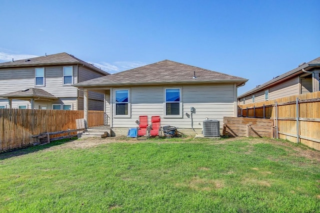 12224 Token Trl, Elgin, TX 78621 - rear view of property with central air condition unit