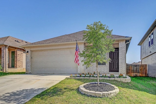 12224 Token Trl, Elgin, TX 78621 - view of front of house with a garage, driveway, and brick siding