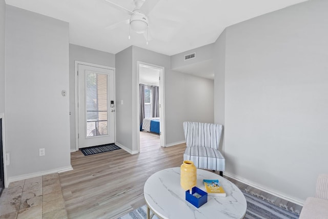 4611 Rosedale Ave, Austin, TX 78756 - sitting room with ceiling fan, wood finished floors, and baseboards