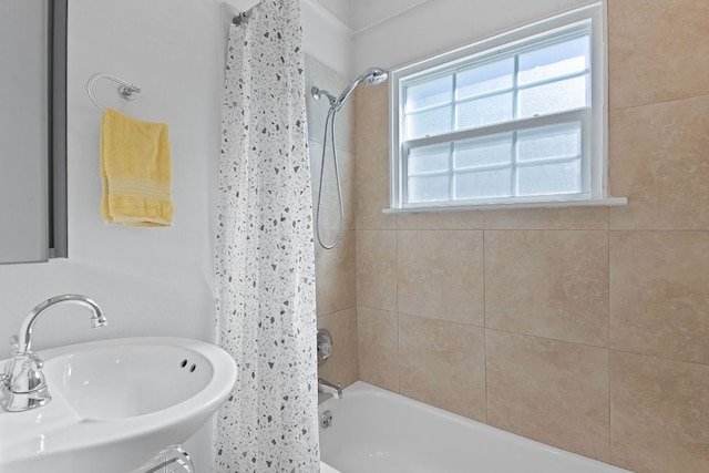 4611 Rosedale Ave, Austin, TX 78756 - full bathroom with a sink and shower / tub combo