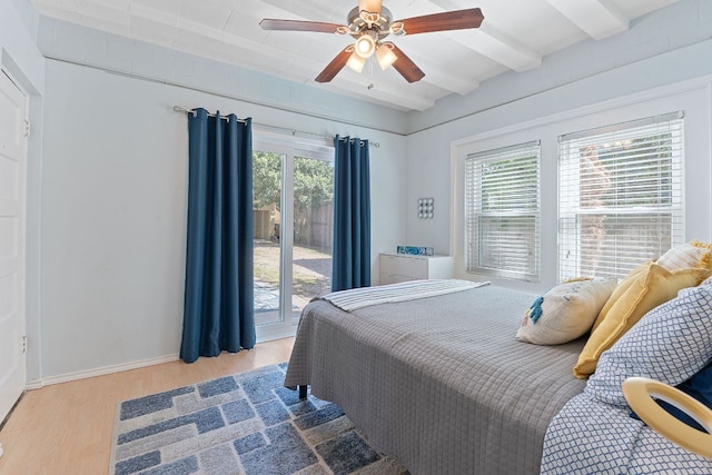 4611 Rosedale Ave, Austin, TX 78756 - bedroom featuring light wood-style floors, beam ceiling, baseboards, ceiling fan, and access to exterior
