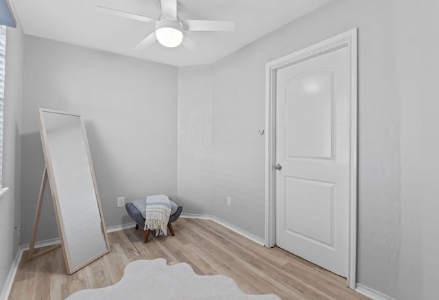 4611 Rosedale Ave, Austin, TX 78756 - unfurnished bedroom featuring wood finished floors, ceiling fan, and baseboards