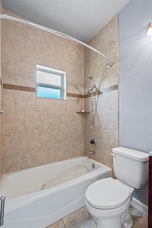 2414 Longview St Unit 303, Austin, TX 78705 - bathroom with shower / bathtub combination and tile patterned flooring