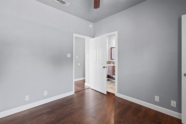 2414 Longview St Unit 303, Austin, TX 78705 - spare room featuring a ceiling fan and dark wood finished floors