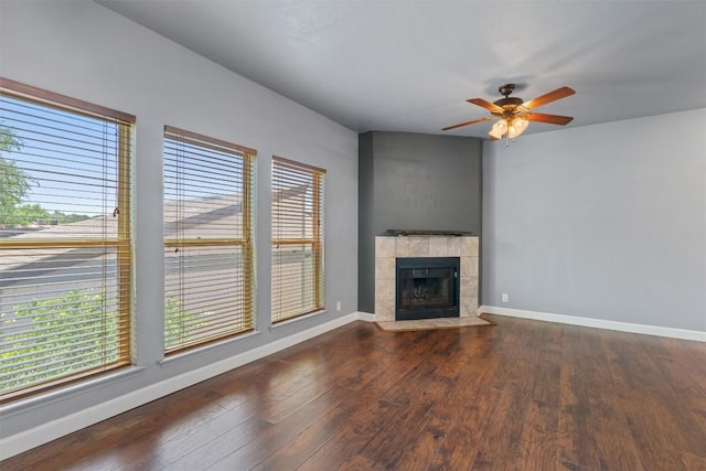 2414 Longview St Unit 303, Austin, TX 78705 - unfurnished living room with a ceiling fan, wood finished floors, and a fireplace