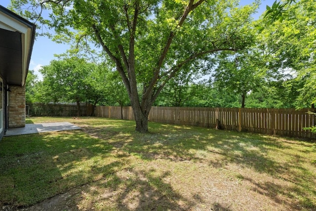 7002 Teaberry Dr, Austin, TX 78745 - fenced backyard with a patio