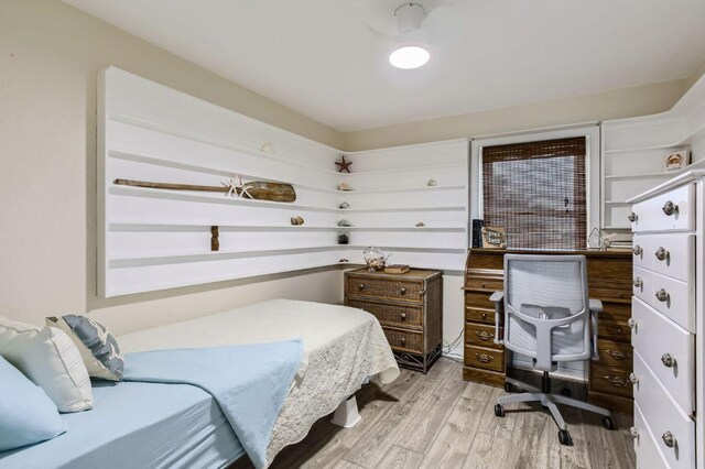 bedroom featuring light wood finished floors