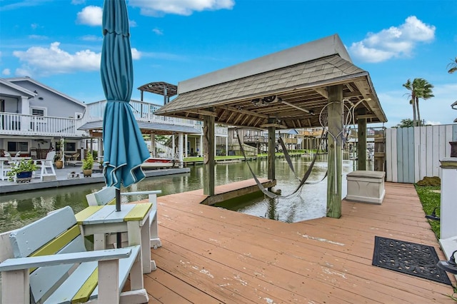 dock area featuring a water view