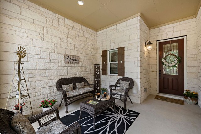 417 Freeman Park Pl, Round Rock, TX 78665 - view of exterior entry with an outdoor living space and stone siding