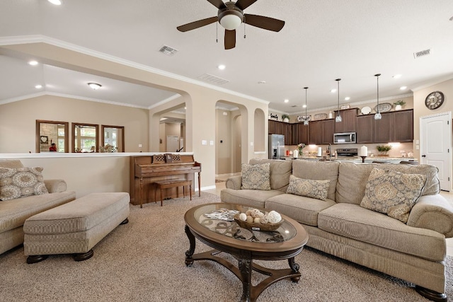 417 Freeman Park Pl, Round Rock, TX 78665 - living area with a ceiling fan, recessed lighting, arched walkways, light carpet, and baseboards