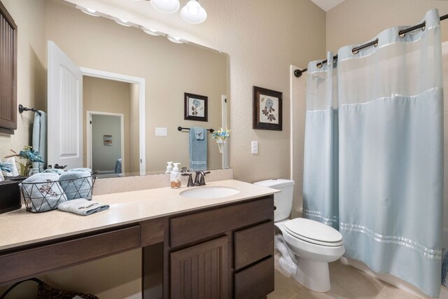 417 Freeman Park Pl, Round Rock, TX 78665 - bathroom with toilet, vanity, tile patterned floors, and a shower with curtain