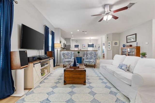 360 Waterloo Dr, Kyle, TX 78640 - living room with ceiling fan and recessed lighting