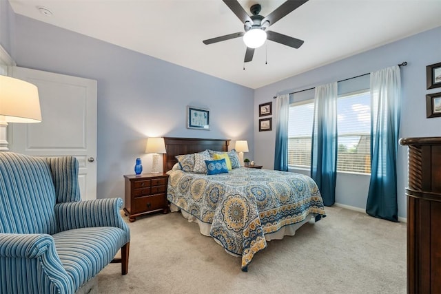 360 Waterloo Dr, Kyle, TX 78640 - carpeted bedroom with a ceiling fan and baseboards