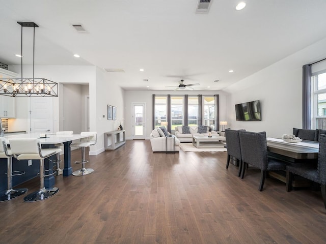 20513 Christie Marie Ln, Pflugerville, TX 78660 - dining space featuring dark wood-style floors, recessed lighting, ceiling fan, and baseboards