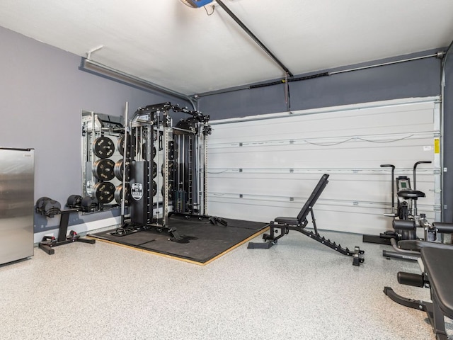 20513 Christie Marie Ln, Pflugerville, TX 78660 - workout room featuring a garage