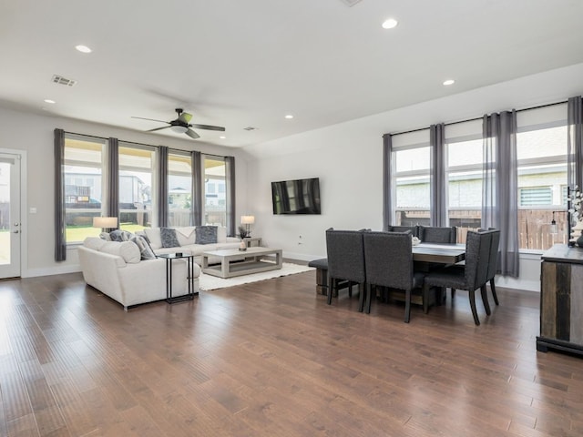 20513 Christie Marie Ln, Pflugerville, TX 78660 - living room featuring a ceiling fan, recessed lighting, dark wood-type flooring, and baseboards