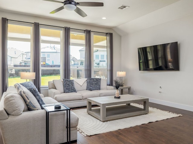 20513 Christie Marie Ln, Pflugerville, TX 78660 - living room with ceiling fan, baseboards, vaulted ceiling, dark wood-type flooring, and recessed lighting