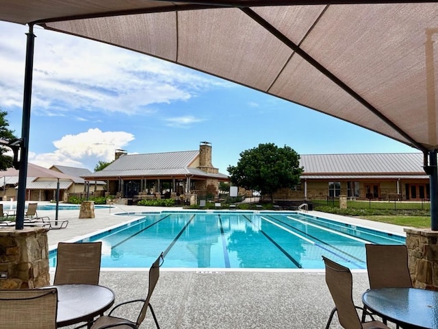 20513 Christie Marie Ln, Pflugerville, TX 78660 - community pool featuring a patio area