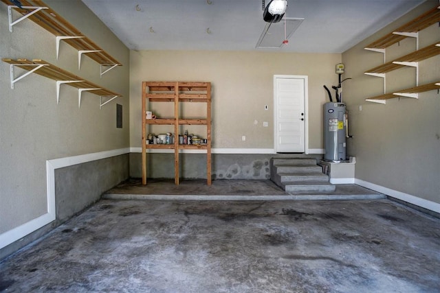 garage with water heater and a garage door opener