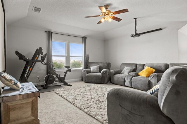 7404 Leonardo Dr, Round Rock, TX 78665 - living room featuring carpet flooring, vaulted ceiling, ceiling fan, and baseboards