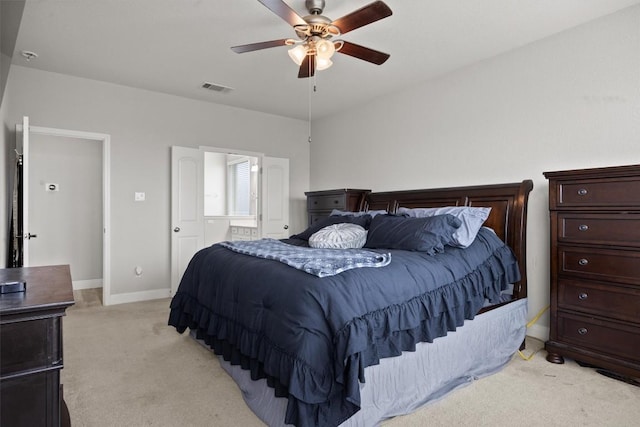 bedroom featuring light carpet, baseboards, and a ceiling fan