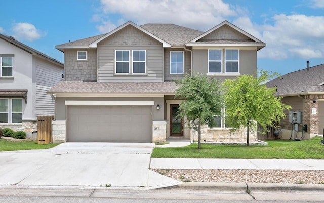 257 Falling Star Ln, Georgetown, TX 78628 - view of front of home with a garage, roof with shingles, driveway, and stone siding