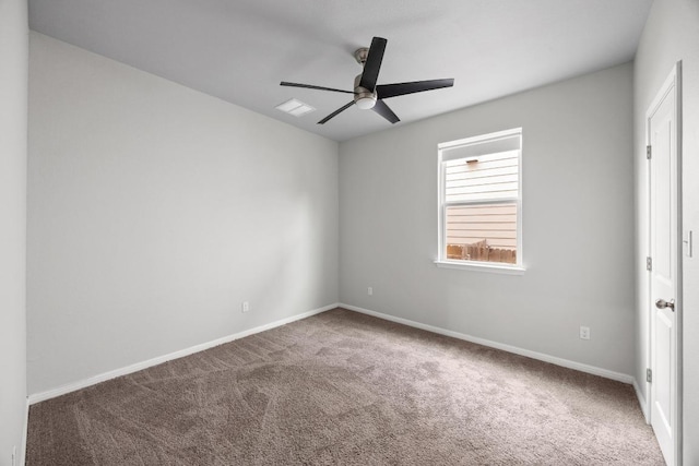 257 Falling Star Ln, Georgetown, TX 78628 - unfurnished bedroom featuring carpet flooring, baseboards, and ceiling fan