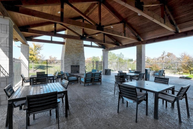 257 Falling Star Ln, Georgetown, TX 78628 - view of patio with outdoor dining space, a gazebo, and an outdoor living space with a fireplace
