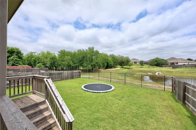 257 Falling Star Ln, Georgetown, TX 78628 - fenced backyard with a water view