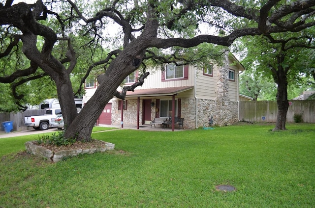907 Pepperell Ct, Austin, TX 78753 - view of front of home with stone siding and a porch