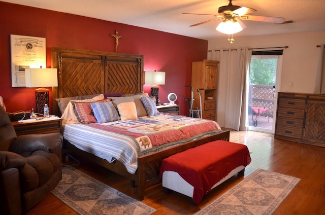 907 Pepperell Ct, Austin, TX 78753 - bedroom featuring access to outside, wood finished floors, and a ceiling fan