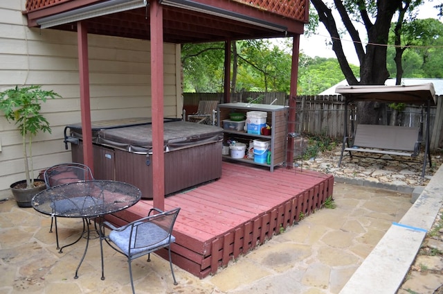 907 Pepperell Ct, Austin, TX 78753 - view of patio with a hot tub, fence, and outdoor dining area