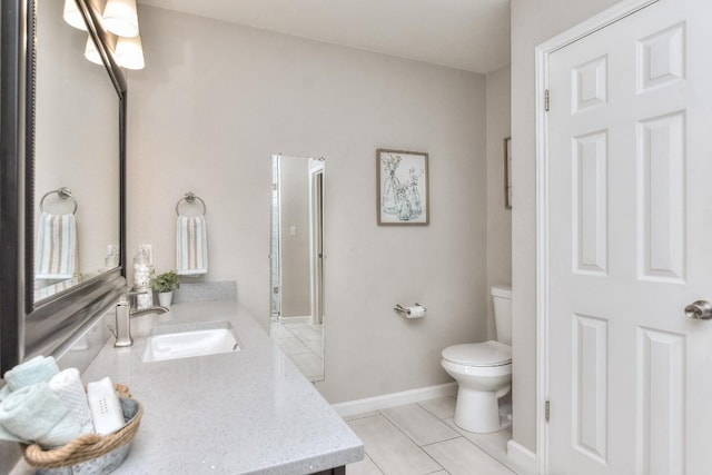 17713 Cahir Glen Cv, Pflugerville, TX 78660 - bathroom with vanity, toilet, tile patterned floors, and baseboards
