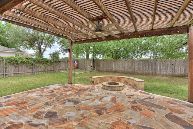 view of patio with an outdoor fire pit, ceiling fan, and a pergola