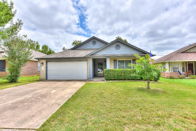 single story home with an attached garage, concrete driveway, a front yard, and brick siding