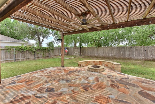view of patio featuring an outdoor fire pit, ceiling fan, and a pergola