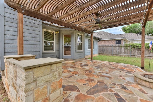 view of patio featuring a pergola and ceiling fan