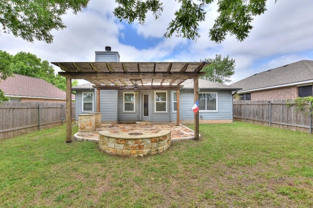 rear view of house featuring a pergola, a chimney, and a patio area