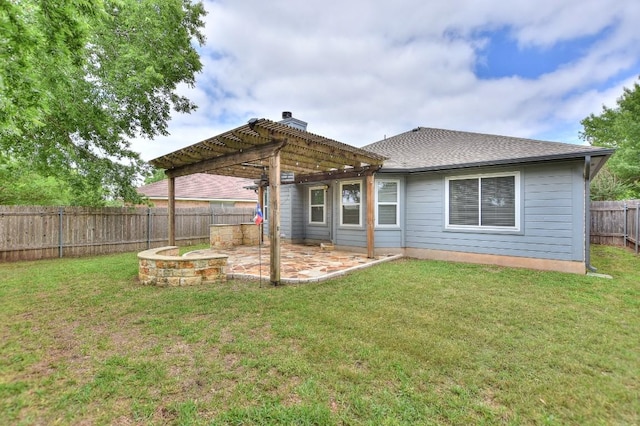 rear view of property with a pergola, a patio area, and roof with shingles