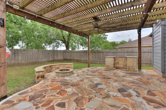 view of patio / terrace featuring a fire pit, a fenced backyard, and a pergola