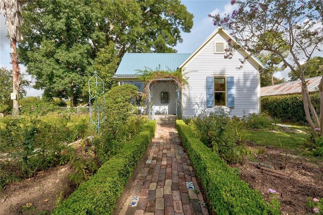 101 Short St, Smithville, TX 78957 - view of front of home featuring a metal roof