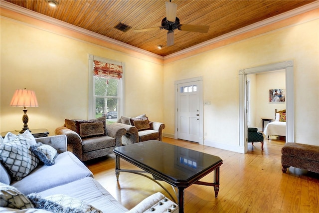 101 Short St, Smithville, TX 78957 - living area featuring wood ceiling, ornamental molding, light wood-style flooring, and ceiling fan