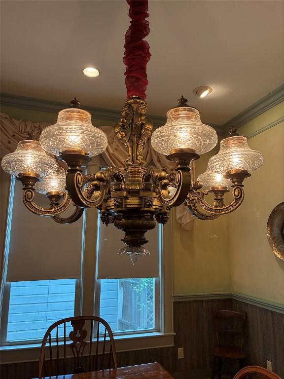 101 Short St, Smithville, TX 78957 - dining area view of a wainscoted wall, a chandelier, ornamental molding, and recessed lighting