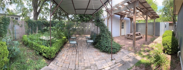 101 Short St, Smithville, TX 78957 - fenced backyard with a pergola and a patio area