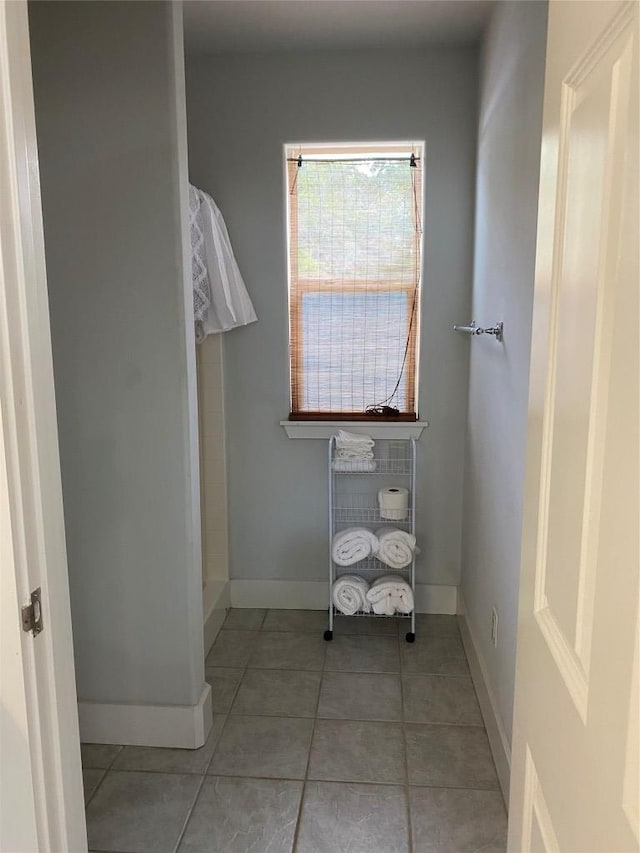 101 Short St, Smithville, TX 78957 - bathroom with baseboards and tile patterned flooring