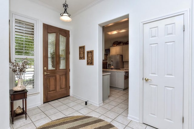 109 Cattle Trail Way, Georgetown, TX 78633 - entrance foyer with ornamental molding, baseboards, and light tile patterned flooring