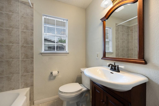 8309 Burrell Dr, Austin, TX 78757 - full bathroom featuring vanity, toilet, bathtub / shower combination, and tile patterned flooring